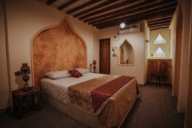 اتاق خواب با طاقچه قوسی در ساحل سینگو