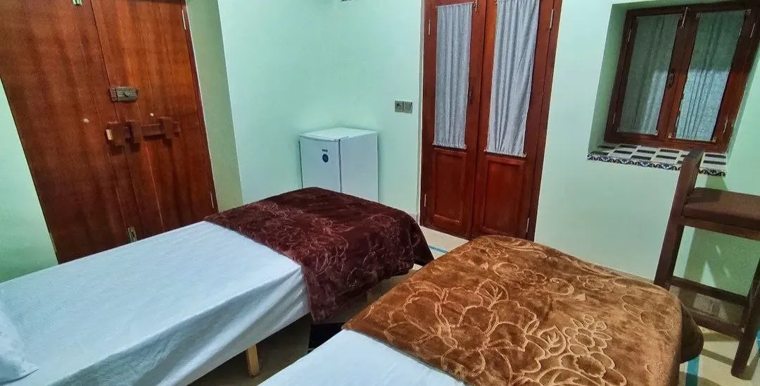 اتاق ملک تاج با دو تخت یک‌نفره