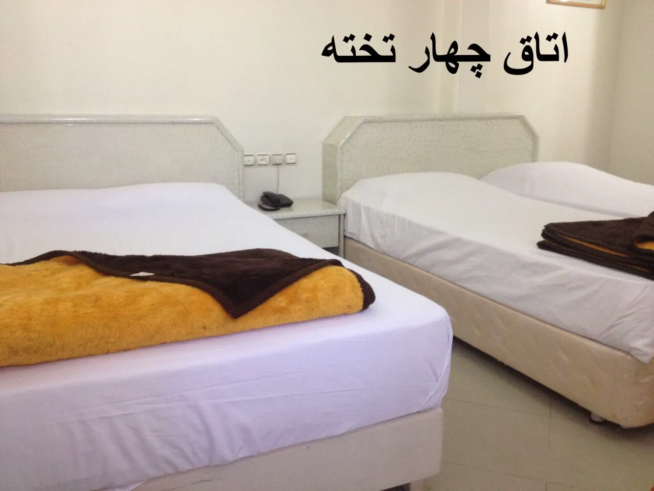 اتاق چهارتخته هتل رضا با چهار تخت