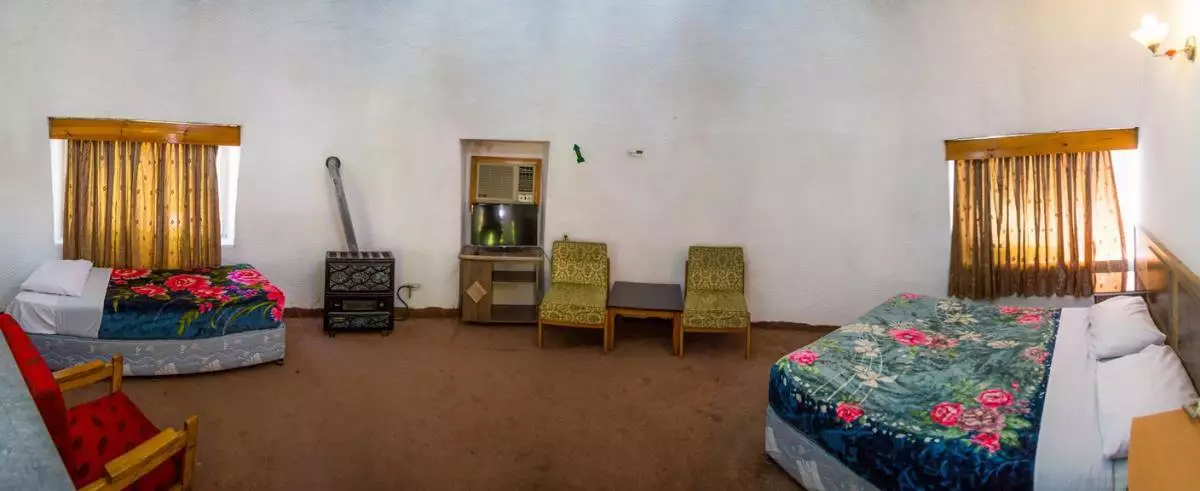 اتاق جهانگردی با دو تخت و بخاری