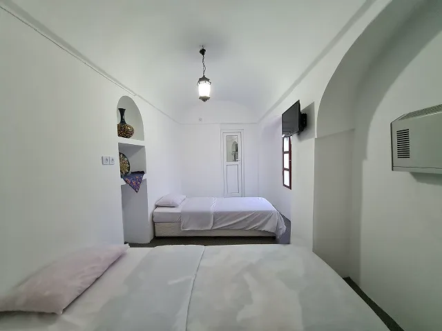 اتاق خواب عمارت افضل با دو تخت