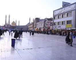 میدان شلوغ و ساختمان هتل آریا