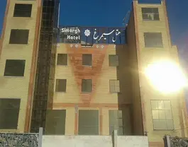 نمای ساختمان آجری هتل سیمرغ
