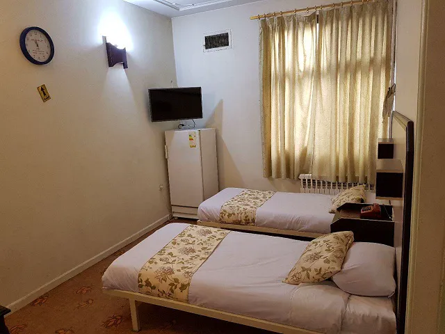 اتاق برنجیان با دو تخت یکنفره